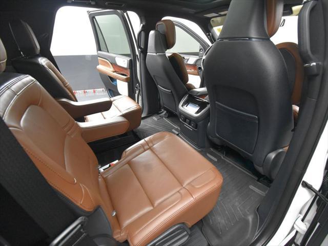 Photo of 2024 Pristine White Metallic Tri-Coat Lincoln Navigator