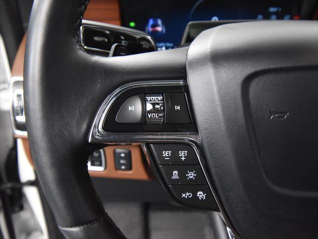 Photo of 2024 Pristine White Metallic Tri-Coat Lincoln Navigator