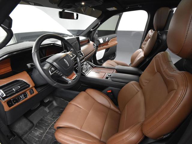 Photo of 2024 Pristine White Metallic Tri-Coat Lincoln Navigator