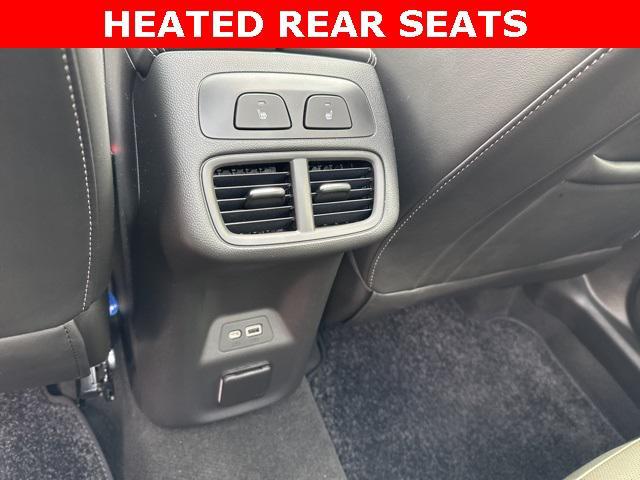 Photo of 2023 Cinnabar Metallic Buick Envision