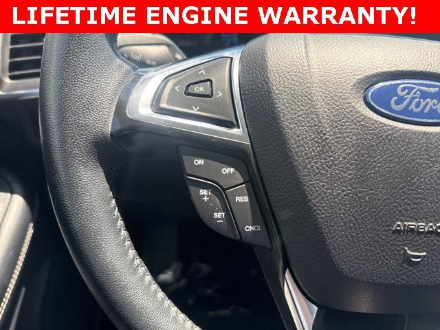 Photo of 2024 Blue Metallic Ford Edge