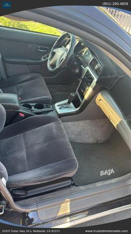 Photo of 2003 Black Subaru Baja