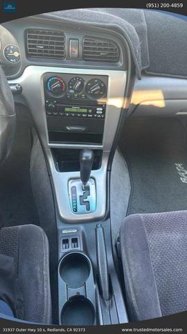 Photo of 2003 Black Subaru Baja