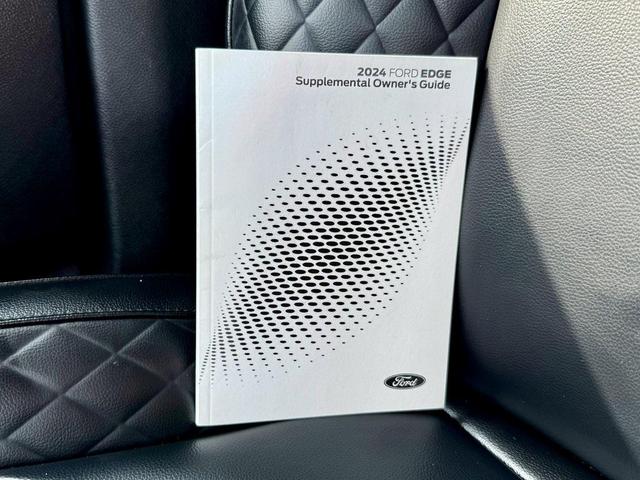Photo of 2024 Black Metallic Ford Edge