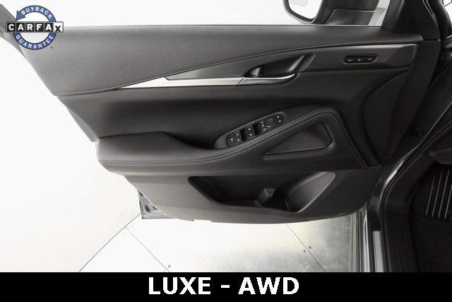Photo of 2023 Moonbow Blue INFINITI QX60