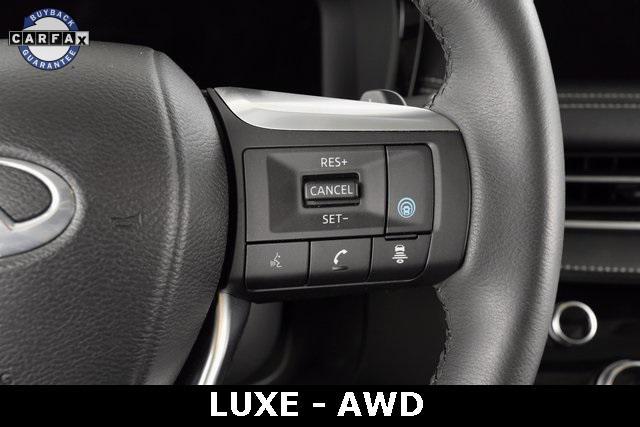 Photo of 2023 Moonbow Blue INFINITI QX60