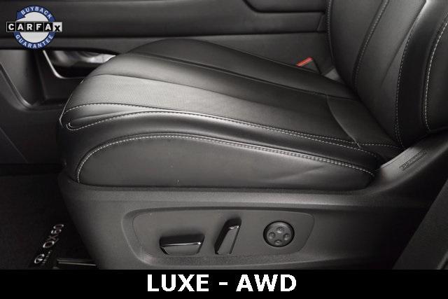 Photo of 2023 Moonbow Blue INFINITI QX60