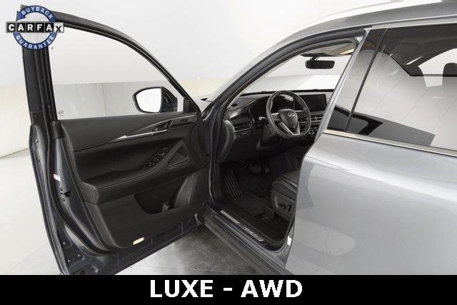 Photo of 2023 Moonbow Blue INFINITI QX60