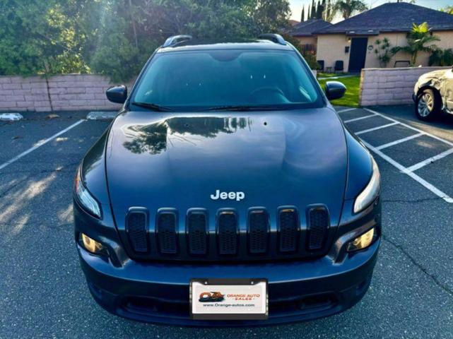 Photo of 2016 Granite Crystal Metallic Clearcoat Jeep Cherokee
