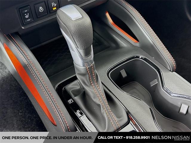 Photo of 2025 Afterburn Orange Nissan Frontier