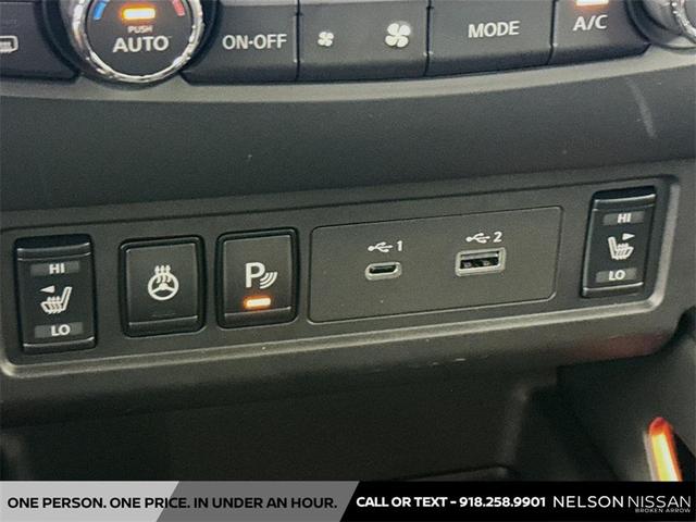 Photo of 2025 Afterburn Orange Nissan Frontier