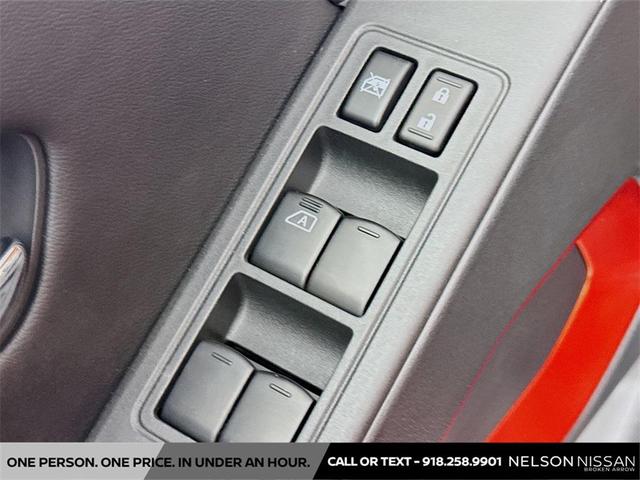 Photo of 2025 Afterburn Orange Nissan Frontier