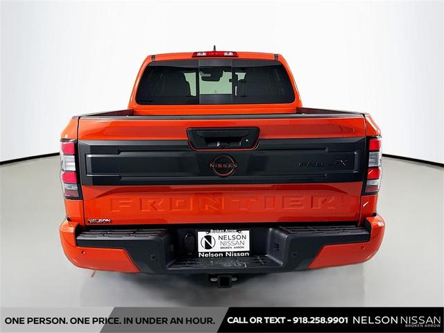 Photo of 2025 Afterburn Orange Nissan Frontier