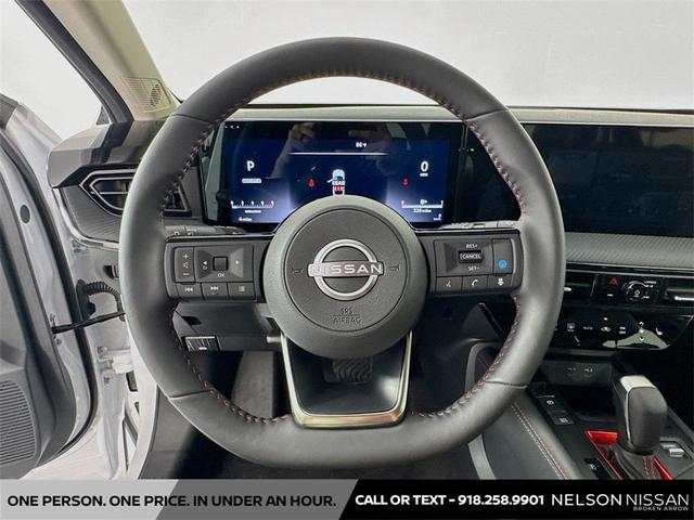 Photo of 2025 Aspen White Tricoat Nissan Kicks