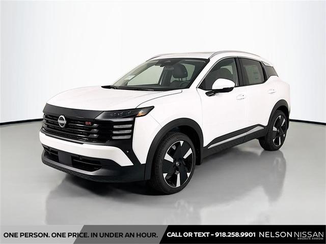 Photo of 2025 Aspen White Tricoat Nissan Kicks