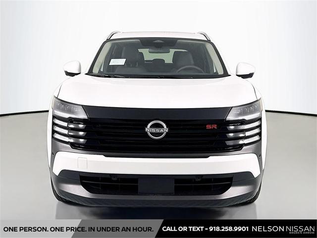 Photo of 2025 Aspen White Tricoat Nissan Kicks