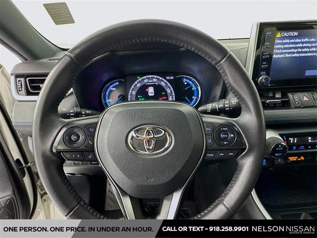 Photo of 2021 Blizzard Pearl/Midnight Black Metallic Toyota RAV4 Hybrid