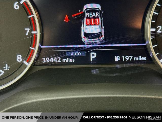 Photo of 2023 Pearl White Tricoat Nissan Rogue
