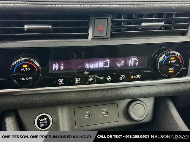 Photo of 2023 Pearl White Tricoat Nissan Rogue