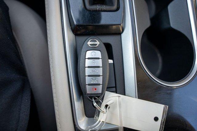 Photo of 2023 Pearl White Tricoat Nissan Altima