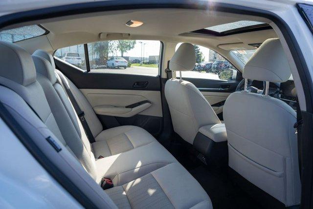Photo of 2023 Pearl White Tricoat Nissan Altima
