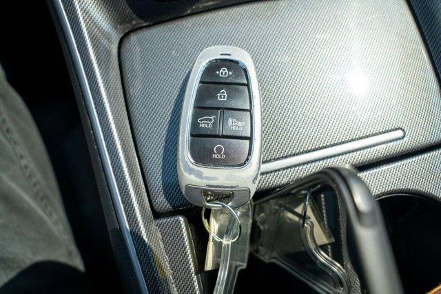 Photo of 2023 Calypso Red Hyundai SANTA FE