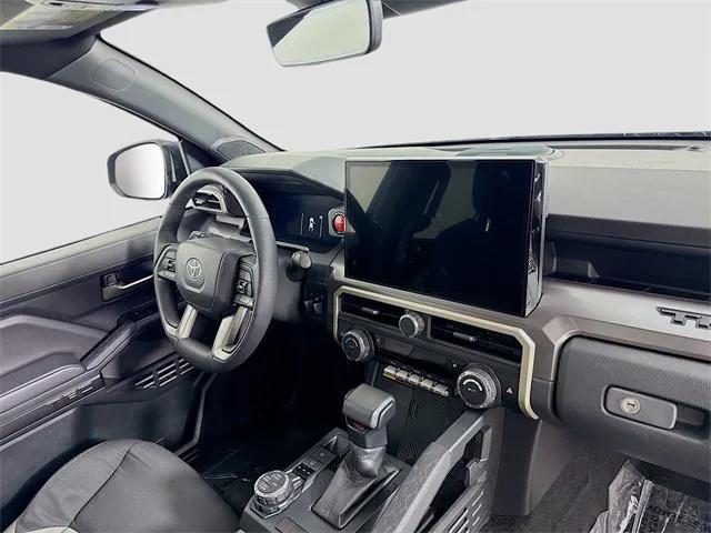 Photo of 2025 Blue Crush Metallic Toyota Tacoma