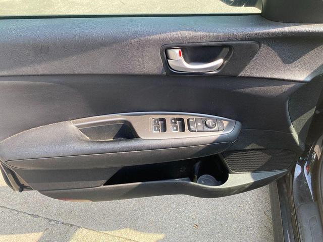 Photo of 2019 Ebony Black Kia Optima