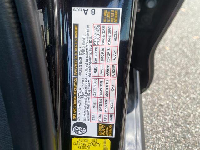 Photo of 2024 Midnight Black Metallic Toyota Corolla Hybrid