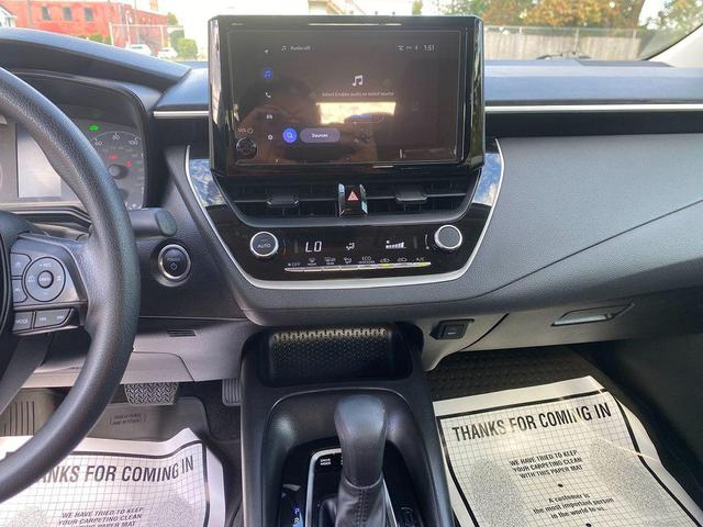 Photo of 2024 Midnight Black Metallic Toyota Corolla Hybrid