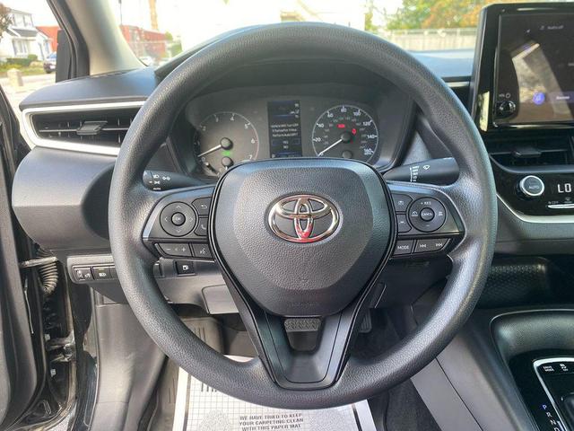Photo of 2024 Midnight Black Metallic Toyota Corolla Hybrid