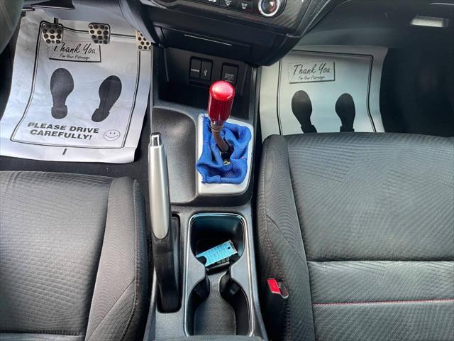 Photo of 2015 Orange Fire Pearl Honda Civic