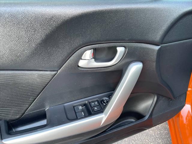Photo of 2015 Orange Fire Pearl Honda Civic
