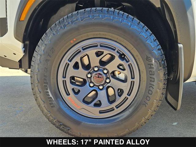 Photo of 2026 Glacier White Nissan Frontier