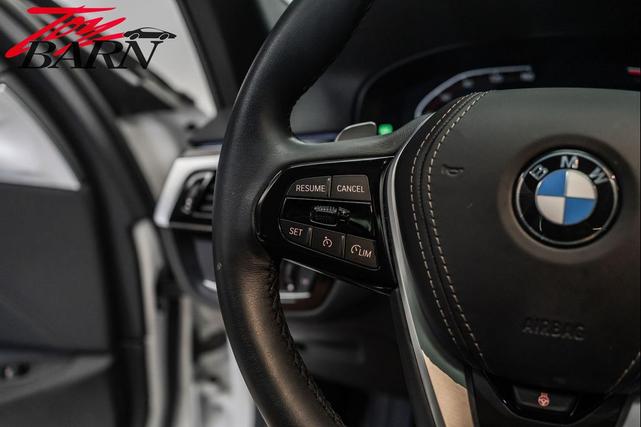 Photo of 2023 Alpine White BMW 540