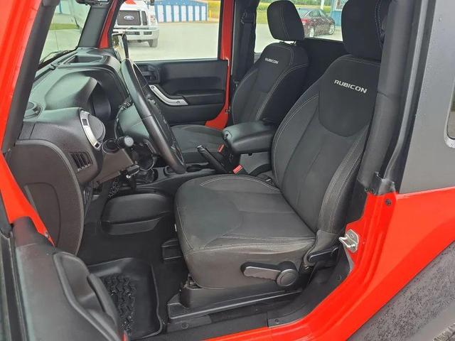 Photo of 2015 Sunset Orange Pearlcoat Jeep Wrangler