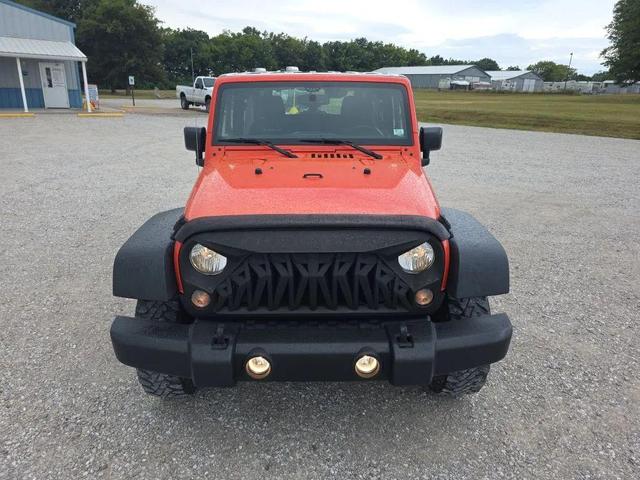 Photo of 2015 Sunset Orange Pearlcoat Jeep Wrangler