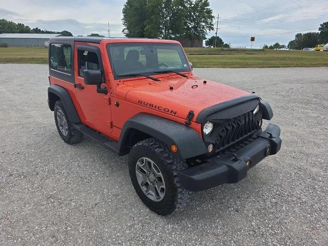 Photo of 2015 Sunset Orange Pearlcoat Jeep Wrangler