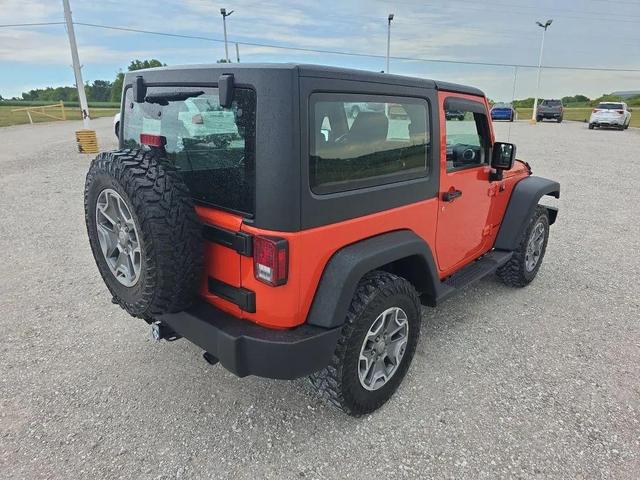 Photo of 2015 Sunset Orange Pearlcoat Jeep Wrangler