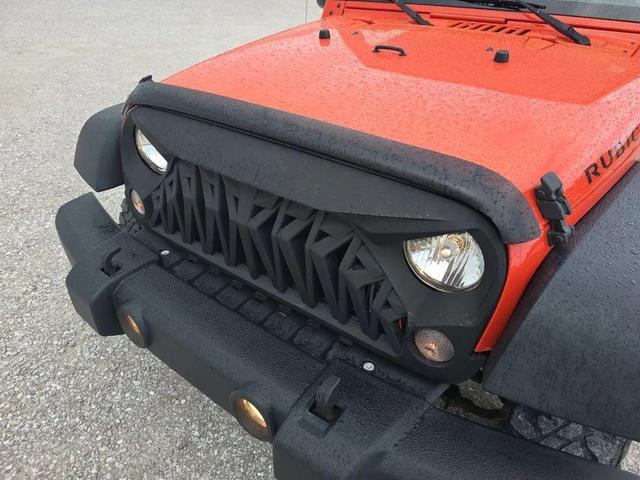 Photo of 2015 Sunset Orange Pearlcoat Jeep Wrangler