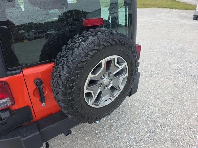 Photo of 2015 Sunset Orange Pearlcoat Jeep Wrangler