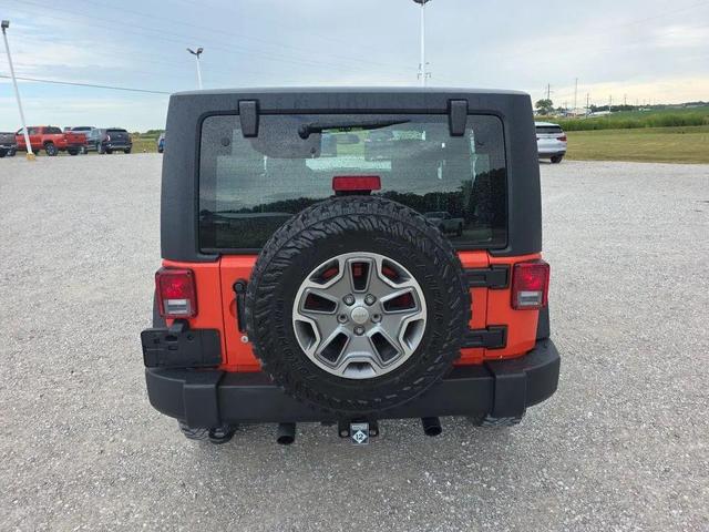 Photo of 2015 Sunset Orange Pearlcoat Jeep Wrangler