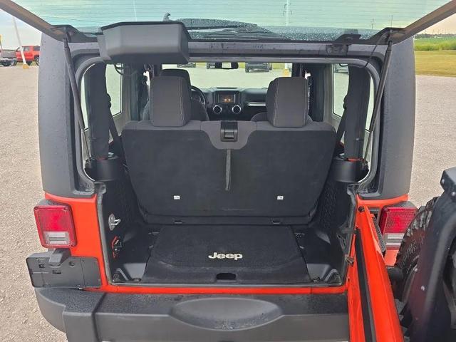 Photo of 2015 Sunset Orange Pearlcoat Jeep Wrangler