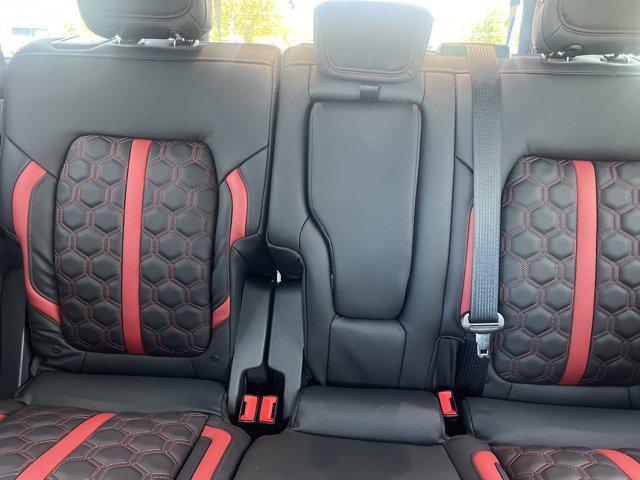 Photo of 2025 Ruby Red Metallic Tinted Clearcoat Ford Bronco