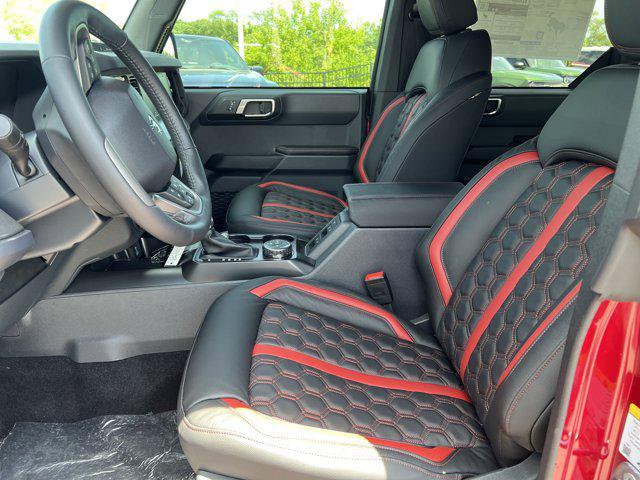 Photo of 2025 Ruby Red Metallic Tinted Clearcoat Ford Bronco