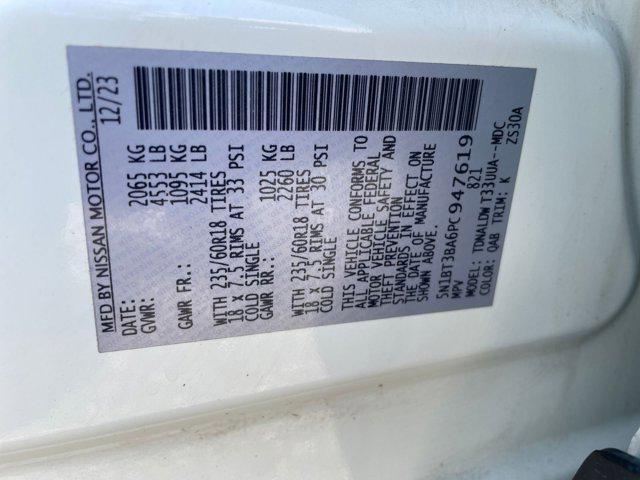 Photo of 2023 Pearl White Tricoat Nissan Rogue