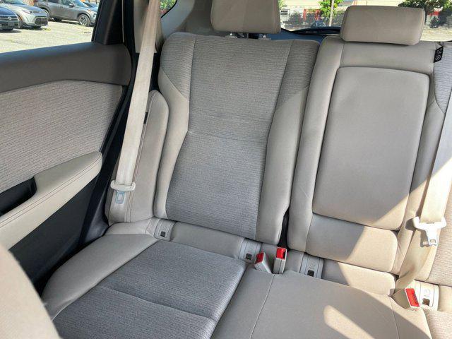 Photo of 2023 Pearl White Tricoat Nissan Rogue