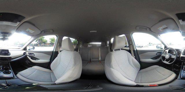Photo of 2023 Pearl White Tricoat Nissan Rogue