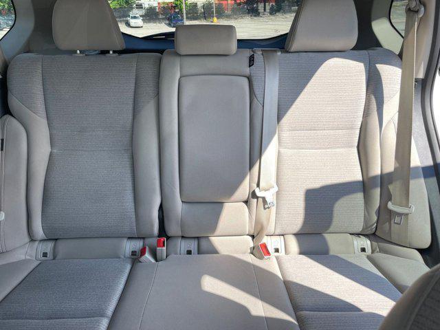 Photo of 2023 Pearl White Tricoat Nissan Rogue