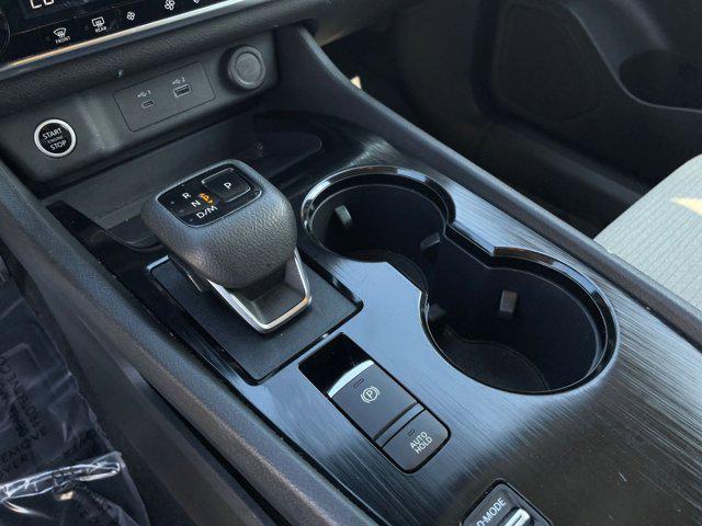 Photo of 2023 Pearl White Tricoat Nissan Rogue